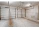 Spacious garage with two-car door and ample room for parking and storage at 1806 Wynthrop Manor Sw Dr, Marietta, GA 30064