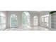 Bright sun room with large windows, tile floors, and double doors at 1806 Wynthrop Manor Sw Dr, Marietta, GA 30064