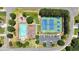 Aerial view of community amenities including a pool, playground, and tennis courts with ample parking at 204 Sawtooth Ct, Canton, GA 30114