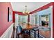 Dining room featuring a large table, bench seating, and modern chandelier at 204 Sawtooth Ct, Canton, GA 30114