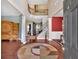Grand foyer with soaring ceilings, hardwood floors, and elegant staircase at 204 Sawtooth Ct, Canton, GA 30114