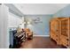 Inviting living room with a piano, hardwood floors and stylish decor at 204 Sawtooth Ct, Canton, GA 30114