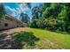 Expansive backyard with lush greenery offers plenty of space for outdoor activities and relaxation at 3904 W Hilda Cir, Decatur, GA 30035