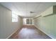 Large basement with carpet flooring and paneled walls, offering versatile space for various uses at 3904 W Hilda Cir, Decatur, GA 30035