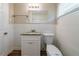 Bathroom featuring granite countertop vanity, white tile walls, and modern fixtures at 3904 W Hilda Cir, Decatur, GA 30035