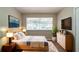 Serene bedroom with a queen-sized bed, ample natural light, and modern decor at 3904 W Hilda Cir, Decatur, GA 30035