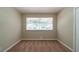 Neutral bedroom featuring carpet and a large window at 3904 W Hilda Cir, Decatur, GA 30035