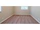 Neutral bedroom featuring carpet and a large window at 3904 W Hilda Cir, Decatur, GA 30035