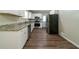 Well-equipped kitchen with stainless steel appliances, granite countertops, and ample cabinet space at 3904 W Hilda Cir, Decatur, GA 30035