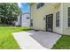 Backyard featuring patio, green grass and the house siding at 1029 Chaterly Ct, Riverdale, GA 30296