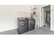 Laundry room with dryer and washer and water heater at 1029 Chaterly Ct, Riverdale, GA 30296