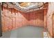 Unfinished basement shows the pink insulation and a blank canvas at 2461 Fernleaf Nw Ct, Atlanta, GA 30318