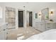 Bright bathroom showcases marble walk-in shower, soaking tub, and and vanities at 2461 Fernleaf Nw Ct, Atlanta, GA 30318