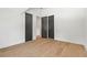 Bedroom boasts hardwood flooring and access to additional storage or closets at 2461 Fernleaf Nw Ct, Atlanta, GA 30318