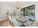Bright dining area with wood floors and backyard access to an outdoor seating area is perfect for entertaining at 2461 Fernleaf Nw Ct, Atlanta, GA 30318