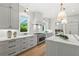Gourmet kitchen with granite countertops, marble backsplash, and stainless steel appliances at 2461 Fernleaf Nw Ct, Atlanta, GA 30318