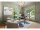 Elegant office space with neutral paint, large windows, and modern light fixture at 2461 Fernleaf Nw Ct, Atlanta, GA 30318
