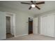 Spacious bedroom features carpeted floor, two closets and attached bathroom at 3381 Birchwood Trl, Snellville, GA 30078