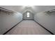 Bonus room with neutral carpet, ample closet space, and natural light at 3381 Birchwood Trl, Snellville, GA 30078