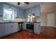 Stylish kitchen boasts stainless steel appliances, ample counter space, and eat-in dining area at 3381 Birchwood Trl, Snellville, GA 30078