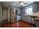 Charming kitchen features stainless steel appliances, stone countertops, and abundant cabinet space at 3381 Birchwood Trl, Snellville, GA 30078