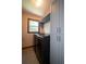 Laundry room with washer, dryer, large window, built-in cabinets and hanging rack at 3381 Birchwood Trl, Snellville, GA 30078