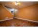 Finished living room has wood floors and stairway at 3381 Birchwood Trl, Snellville, GA 30078