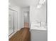 Bathroom boasts a glass shower, double vanity, and sleek fixtures at 1119 Lockhart Way, Douglasville, GA 30135