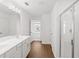 Bathroom boasts a glass shower, double vanity, and sleek fixtures at 1119 Lockhart Way, Douglasville, GA 30135