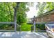 Inviting backyard deck offering serene views of the expansive, lush green lawn at 1342 Old Johnson Ferry Ne Rd, Brookhaven, GA 30319