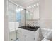 Functional bathroom featuring a shower with sliding glass doors, white fixtures, and updated vanity at 1342 Old Johnson Ferry Ne Rd, Brookhaven, GA 30319