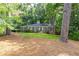 Charming brick home with lush landscaping and a welcoming front entrance at 1342 Old Johnson Ferry Ne Rd, Brookhaven, GA 30319