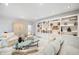 Bright living room with fireplace, custom built-in shelving, and ample seating at 1342 Old Johnson Ferry Ne Rd, Brookhaven, GA 30319