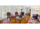 Inviting living room filled with natural light, showcasing hardwood floors and comfortable seating at 1342 Old Johnson Ferry Ne Rd, Brookhaven, GA 30319