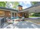 Inviting outdoor patio with stylish seating, perfect for relaxing and entertaining guests at 1342 Old Johnson Ferry Ne Rd, Brookhaven, GA 30319