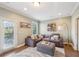 Comfortable living room with a plush sectional, accent pillows, and neutral decor at 255 Southerland Ne Ter # 207, Atlanta, GA 30307