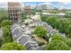 Expansive aerial view of community shows lush landscaping, city views and ample parking at 3655 Habersham Road Northeast Ne Rd # B249, Atlanta, GA 30305