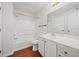 Bright bathroom featuring a shower-tub combo, white vanity, and large mirror at 3655 Habersham Road Northeast Ne Rd # B249, Atlanta, GA 30305