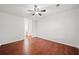 Spacious bedroom with a ceiling fan and warm wood flooring, flooded with natural light at 3655 Habersham Road Northeast Ne Rd # B249, Atlanta, GA 30305