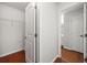 View of walk-in closet with wire shelving and the doorway to a bathroom with tile floors at 3655 Habersham Road Northeast Ne Rd # B249, Atlanta, GA 30305