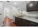 Open-concept kitchen featuring modern appliances, sleek countertops, and ample cabinet space at 3655 Habersham Road Northeast Ne Rd # B249, Atlanta, GA 30305