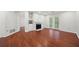 Open living space offers hardwood floors, fireplace, and patio access with lots of natural light at 3655 Habersham Road Northeast Ne Rd # B249, Atlanta, GA 30305