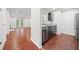 Open-concept living space combining kitchen, dining, and living areas for seamless interaction at 3655 Habersham Road Northeast Ne Rd # B249, Atlanta, GA 30305