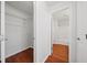 Spacious walk-in closet with shelving and well-maintained flooring for organized storage at 3655 Habersham Road Northeast Ne Rd # B249, Atlanta, GA 30305
