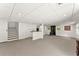 Finished basement with carpet, recessed lighting, fresh white walls, and bar area ready for entertaining at 6875 Sunny Brook Lane Northeast, Sandy Springs, GA 30328