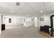 Finished basement with new carpet and fresh paint, offering versatile space for entertainment or recreation at 6875 Sunny Brook Lane Northeast, Sandy Springs, GA 30328