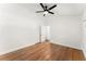 Spacious bedroom with vaulted ceilings, hardwood floors, a ceiling fan, and lots of natural light at 6875 Sunny Brook Lane Northeast, Sandy Springs, GA 30328
