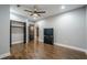 Bedroom with hardwood floors, a closet, and a television on a dresser at 875 Soaring Cir, Marietta, GA 30062
