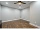 Bedroom with hardwood floors, ceiling fan, and neutral wall color at 875 Soaring Cir, Marietta, GA 30062