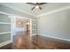 Bonus room with hardwood floors, crown molding and access to the kitchen at 875 Soaring Cir, Marietta, GA 30062